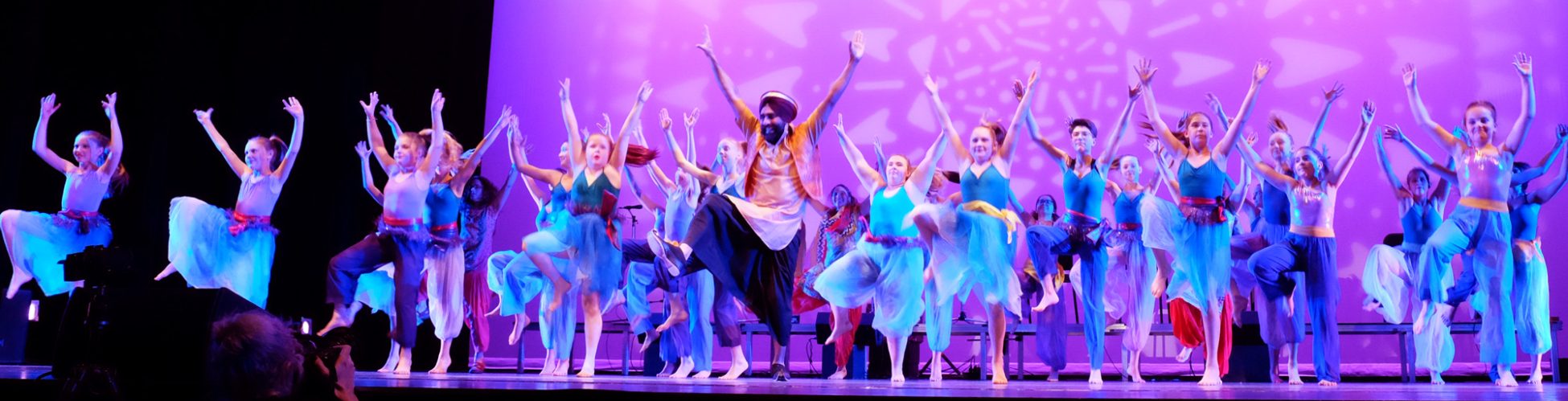 School students from the Yukon performing Bhangra with Gurdeep at the Yukon Arts Centre.