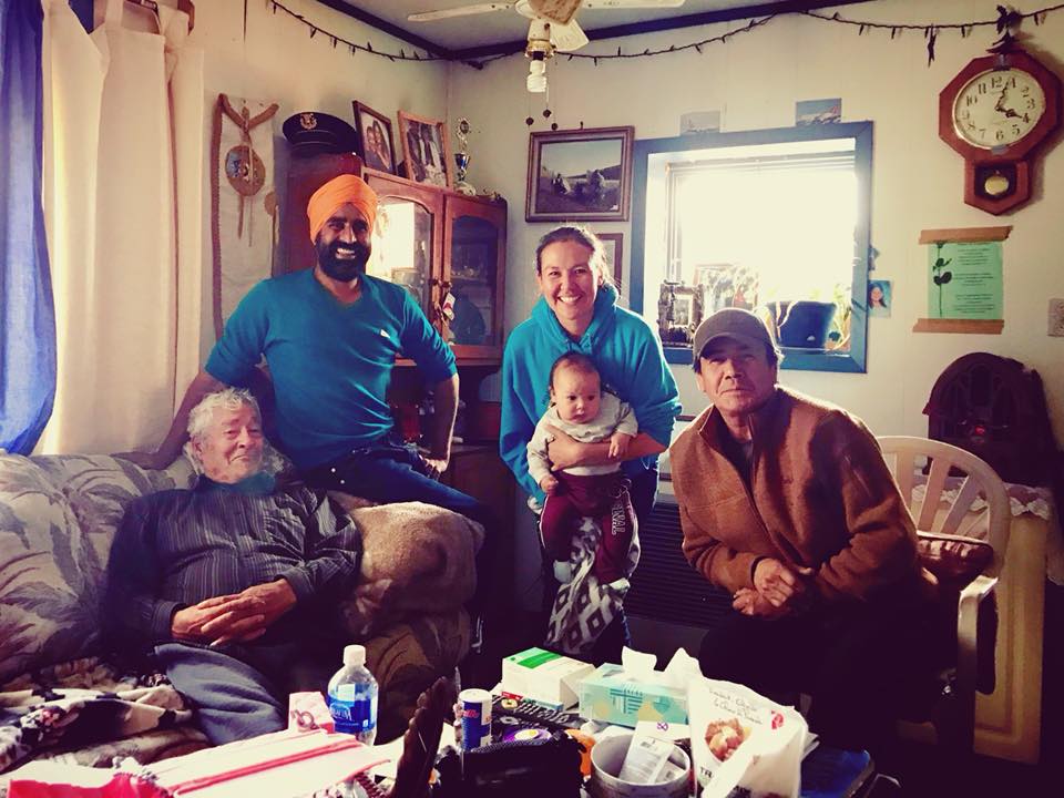 Gurdeep in Old Crow, Yukon, with Stephen Frost Sr., a respected Vuntut Gwitchin First Nations elder and his family