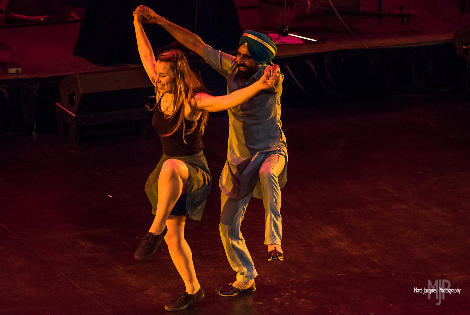 In this photo, Emily Payne is dancing Blues Fusion while Gurdeep is showcasing his Bhangra moves. They combine their dances to showcase elements of unity in dance arts at the Yukon Arts Centre in 2018.