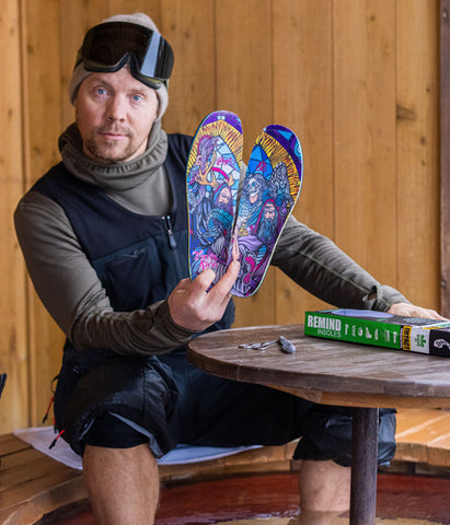 Travis Rice holding his signature orthotic insoles The Medic Impact 3rd Eye