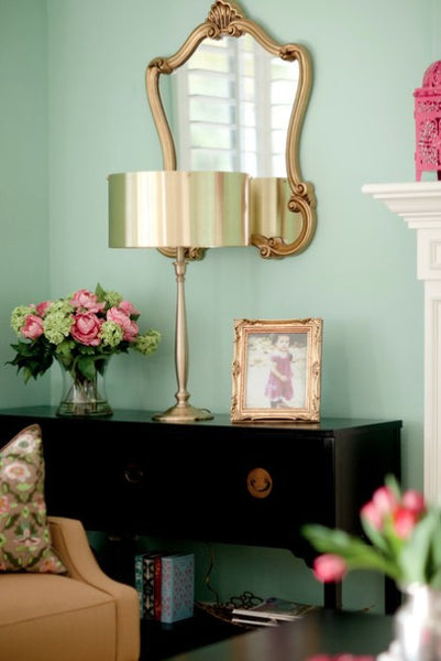 Uttermost Walton Gold Wall Mirror with a lamp