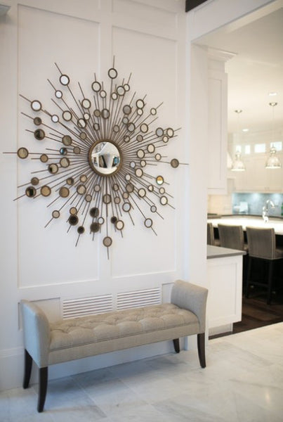 Uttermost Raindrops wall mirror in the hallway