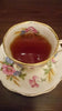 China cup of black tea with ginger without milk