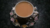 cup of ceylon dimbula black tea with milk