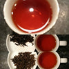 collage of yunnan puerh grade 1 tea with dried and brewed tea leaves