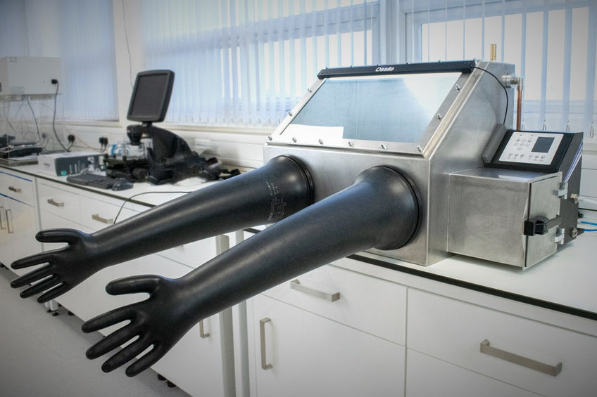 Positive pressure glove box with gloves inflated