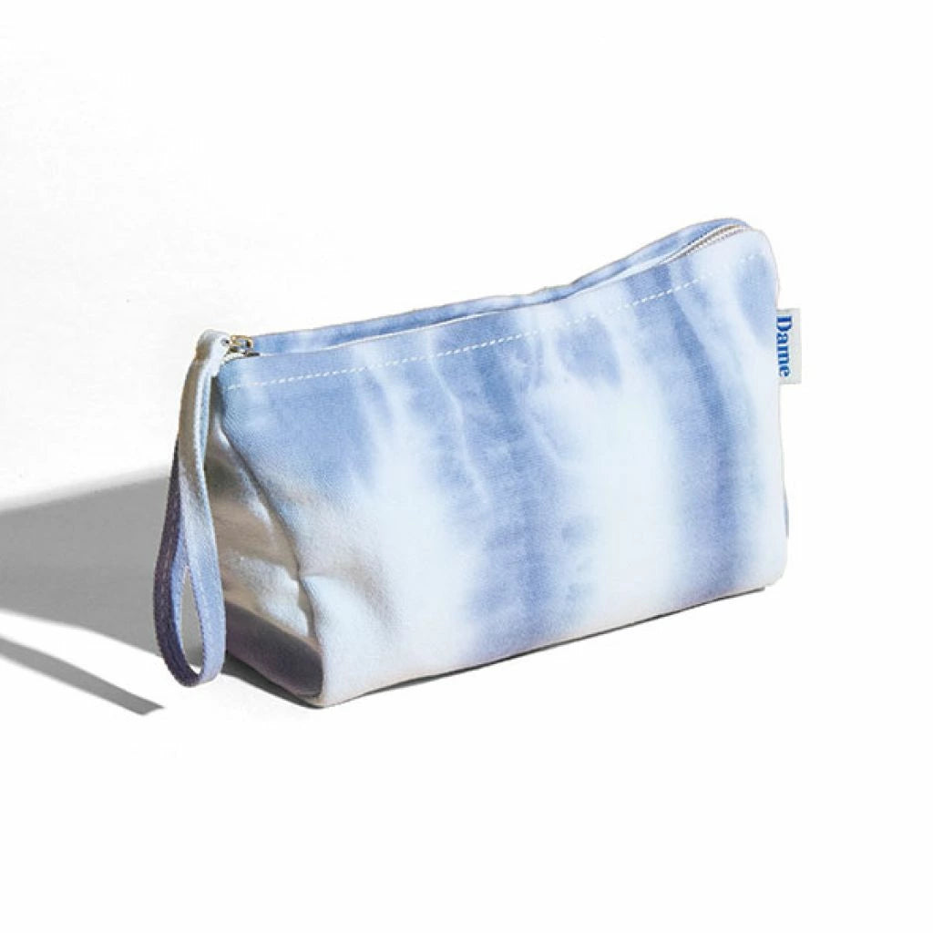 To You  günstig Kaufen-Dame Products - Stash Toy Pouch Sky. Dame Products - Stash Toy Pouch Sky <![CDATA[Stash is a zippable pouch for keeping your sexy essentials close at hand. Its inner pockets and elastics keep your toys, cables, and condoms organized, while its stain-resis