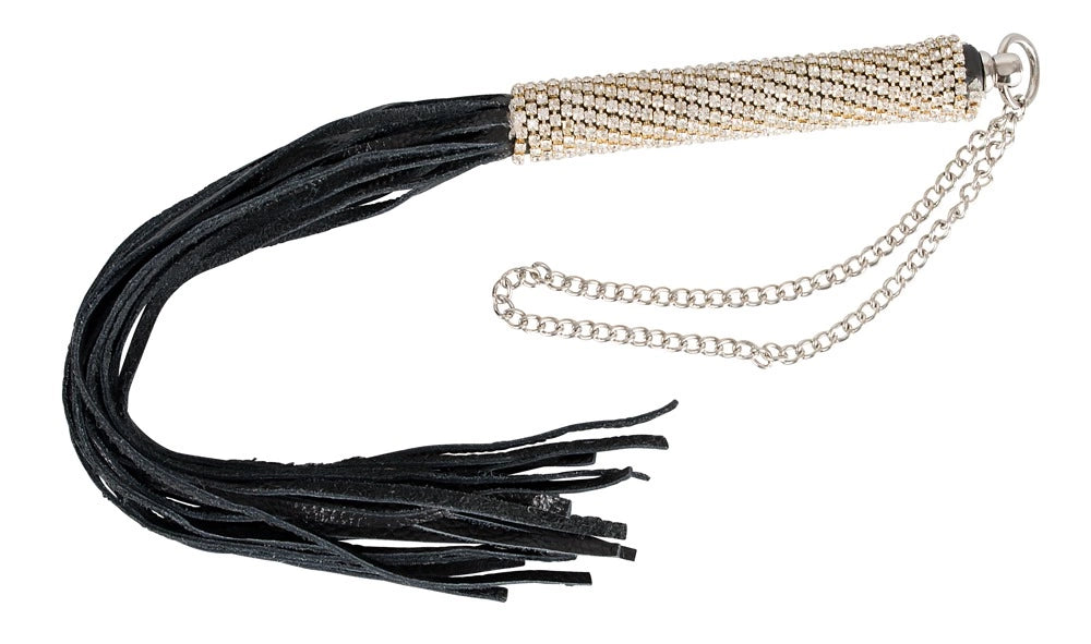 Flogger D günstig Kaufen-Mini Flog Rhinestones. Mini Flog Rhinestones <![CDATA[For loving strokes!. Black mini flogger with slender straps and rhinestones on the handle. Complete length approx. 40 cm. Polyurethane, metal.]]>. 