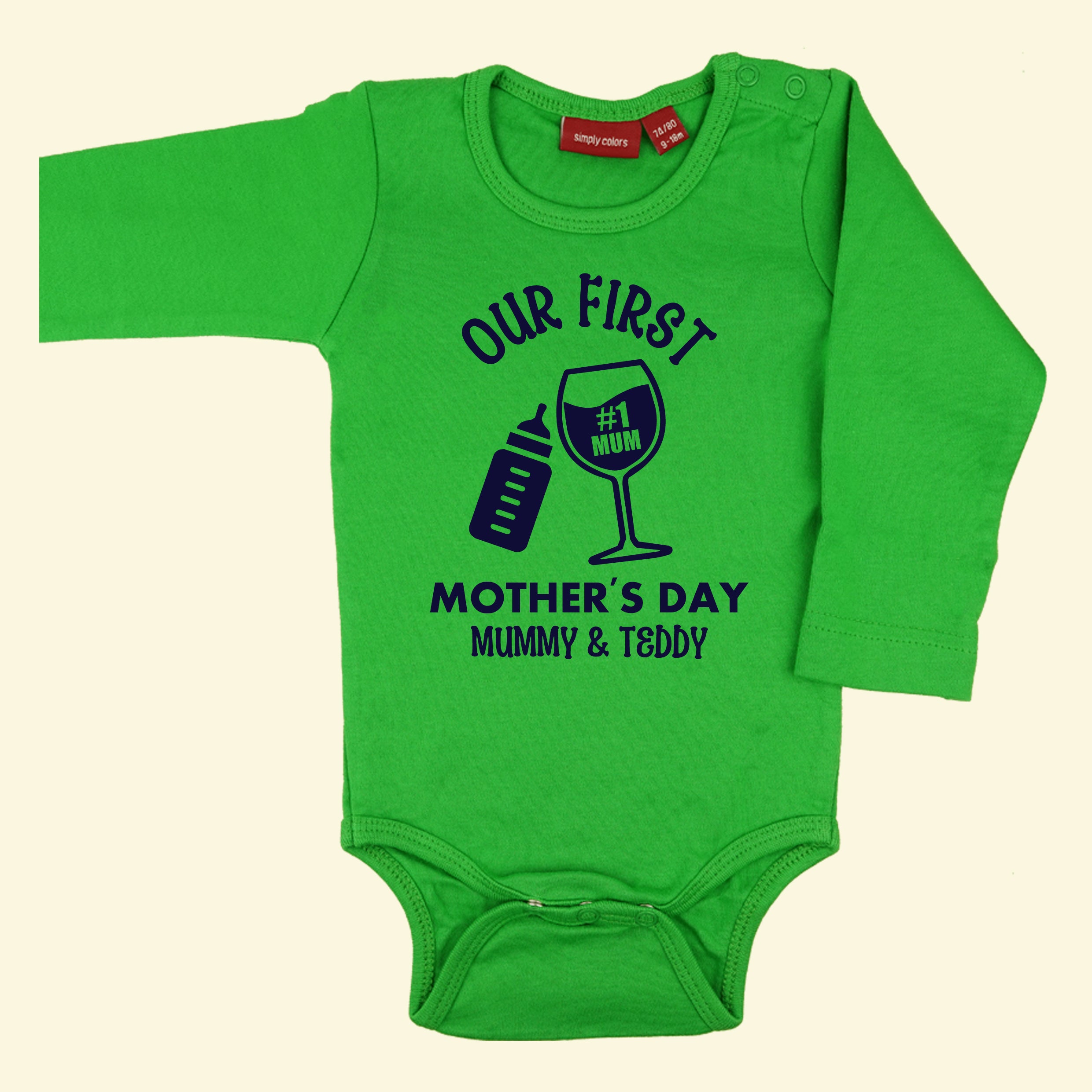 Green bodysuit with design of Our First Mother's Day Mummy & Teddy. With a baby bottle and wine glass tilted together. Printed in navy.