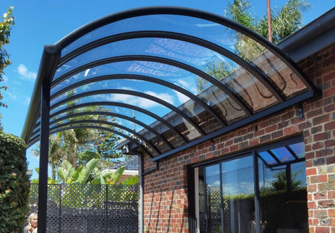 curved pergola with transparent roofing