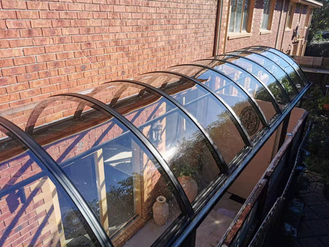 Curved pergola roofing