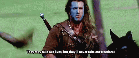mel gibson as william wallace in braveheart saying they may take our lives but they'll never take our freedom