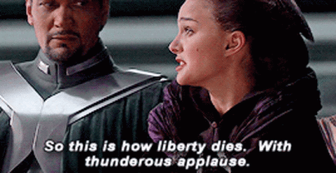 natalie portman as padme in star wars revenge of the sith when she says so this is how liberty dies with thunderous applause