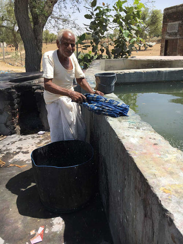 Fabrics are carefully washed by hand and laid to dry in the sun.