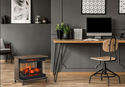 modern open office with freestanding electric fireplace