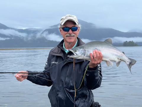 Bryan Butcher in Alaska, with a Pink Salmon Caught on El Jefe