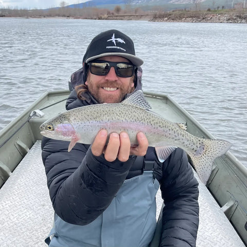 @missoulaflyguy with a great rainbow trout on The Clark Fork in Montana