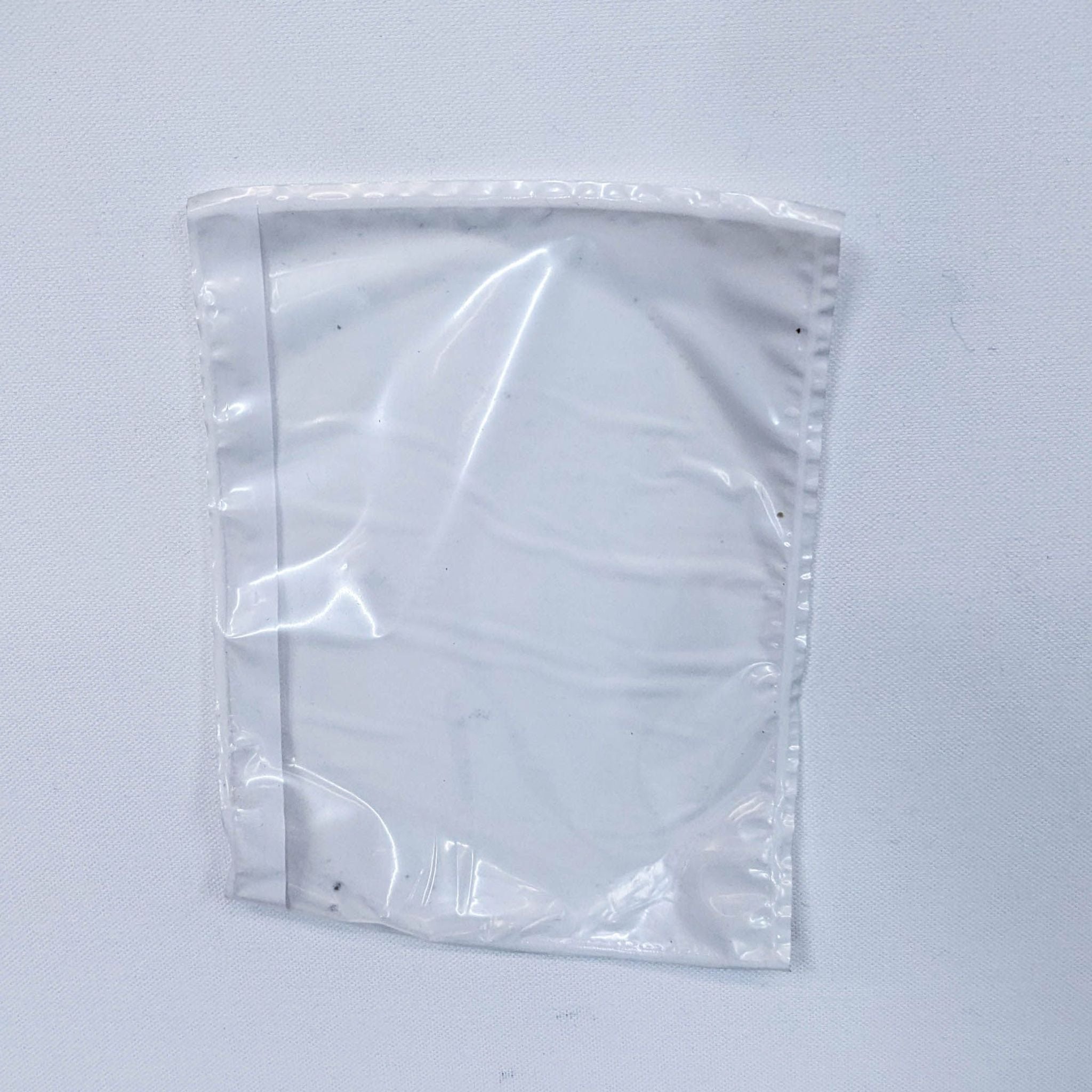 a piece of cloth with a tag on it 
