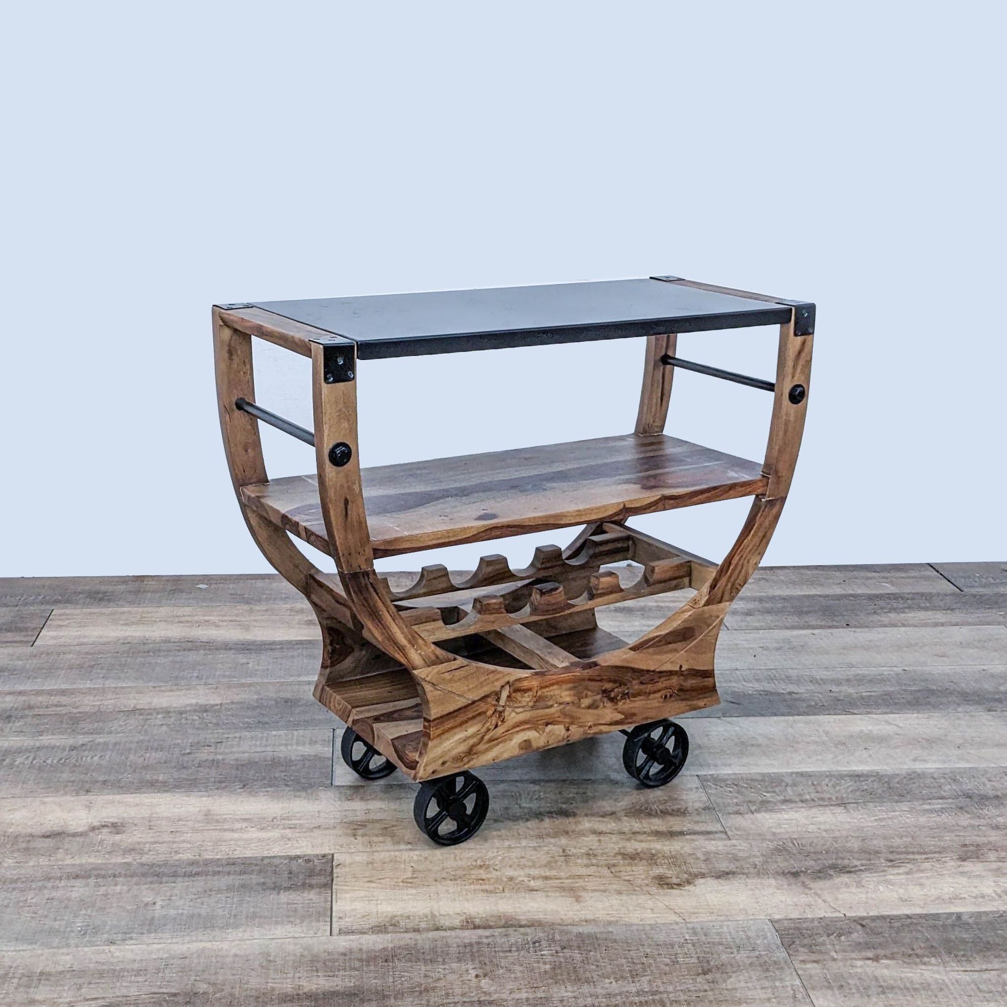 Mobile wooden bar cart by Reperch with metal upper surface, dual shelving, and integrated four-slot wine rack.