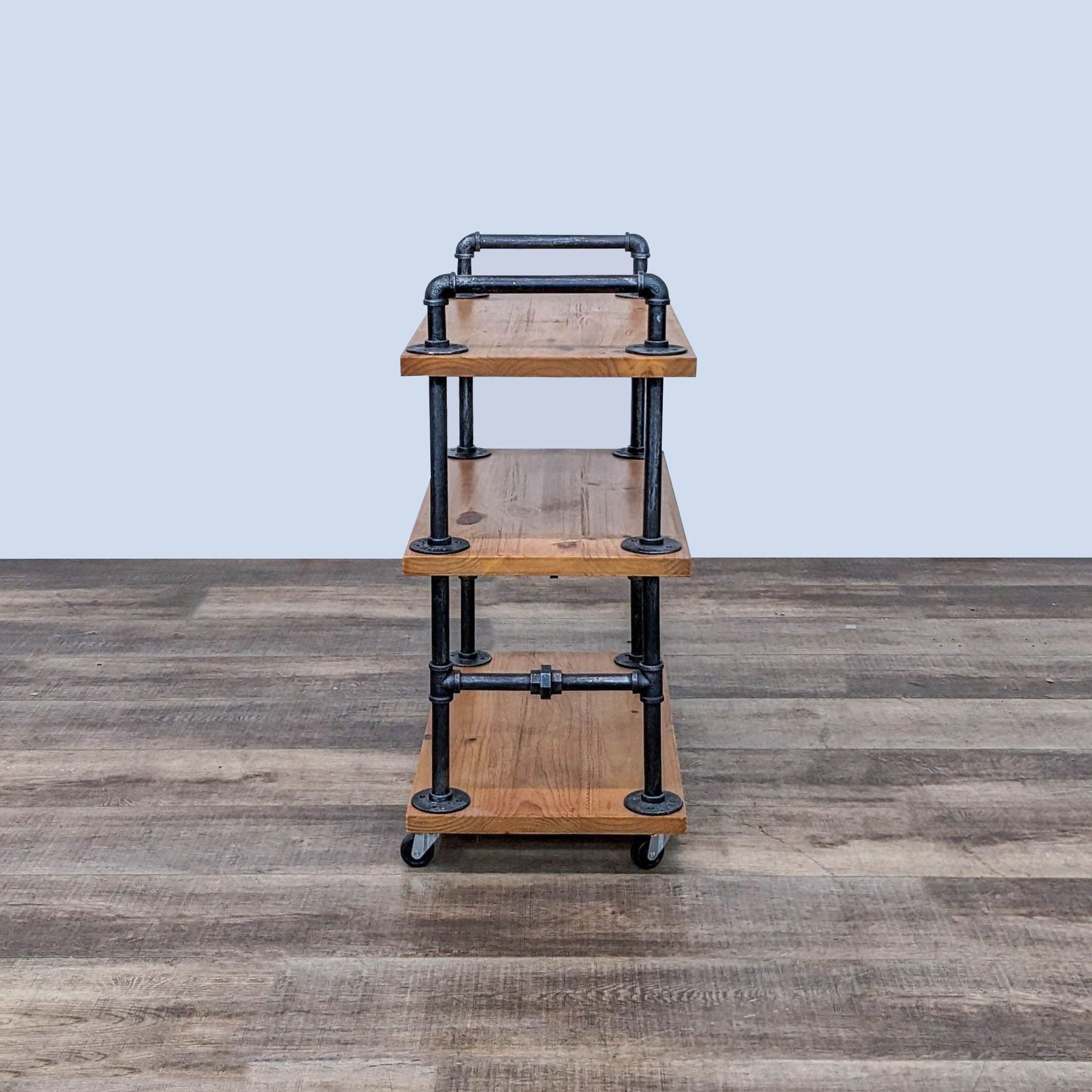 A Dofurnilim brand three-tier rolling cart with solid wood shelves and a sturdy water pipe frame on casters.