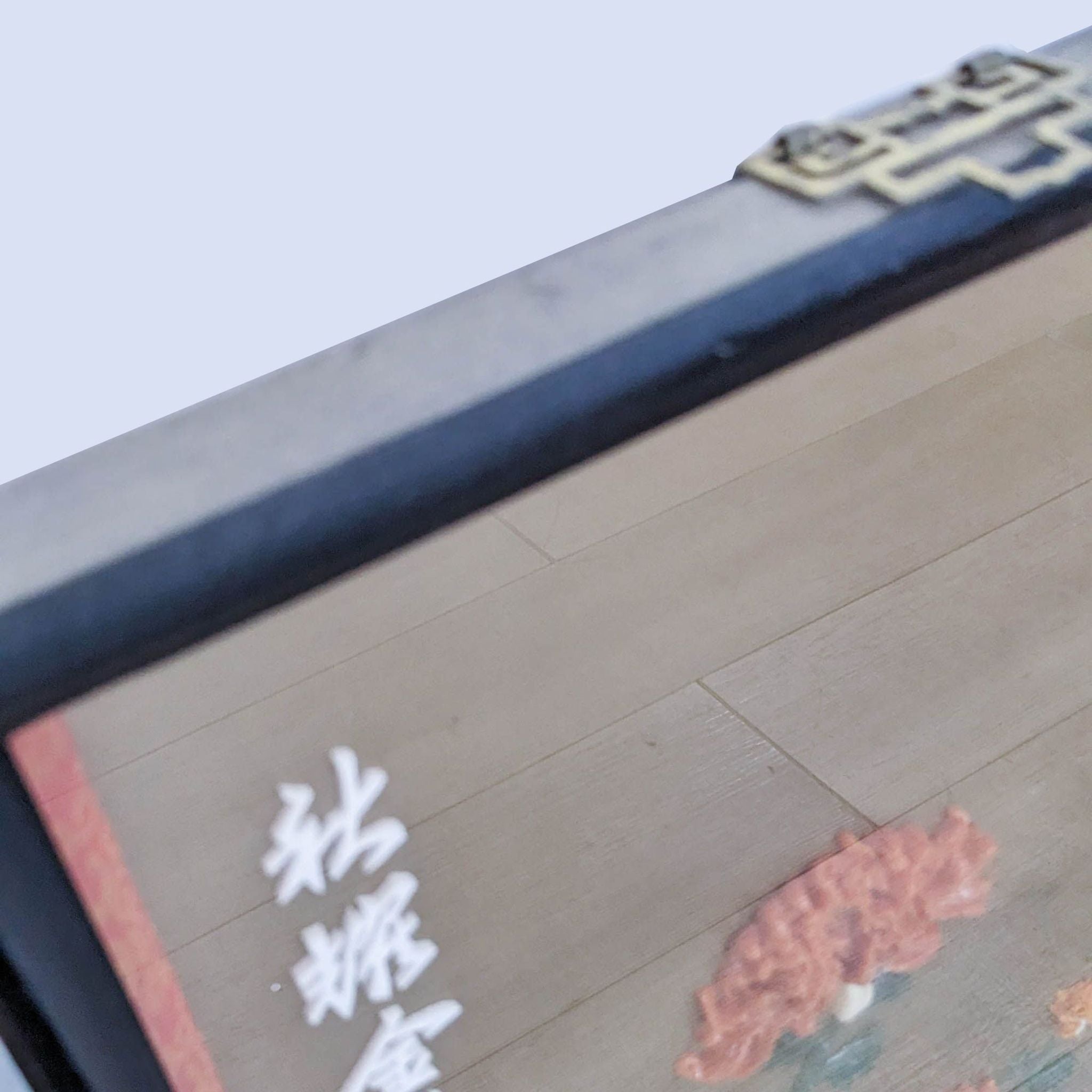 Image 2: Close-up of framed collage's edge, displaying intricate design details and Chinese text, part of Reperch's floral art series.