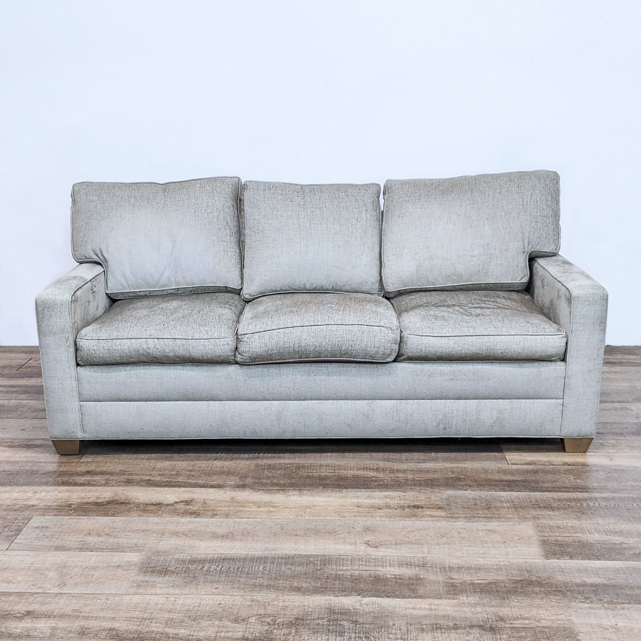 Ethan Allen Spencer modern 3-seat sofa with track arms and T-back cushions on wood finish feet.