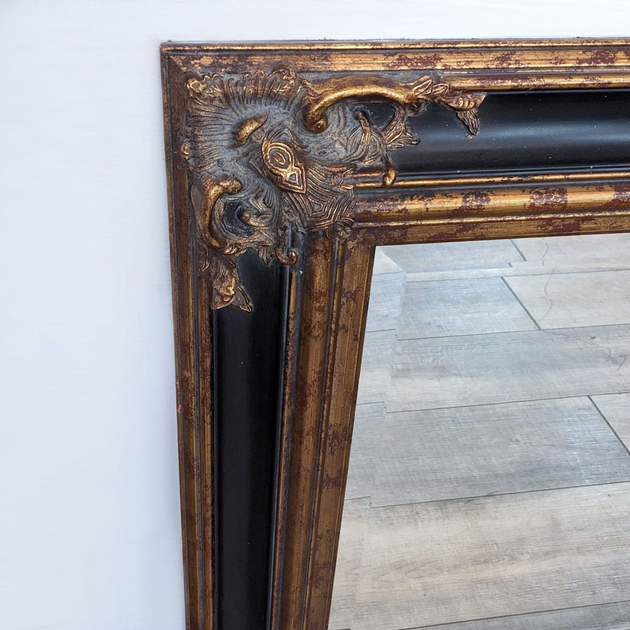 Elegant Baker Knapp and Tubbs mirror featuring ornate frame details, showcasing the vintage design.