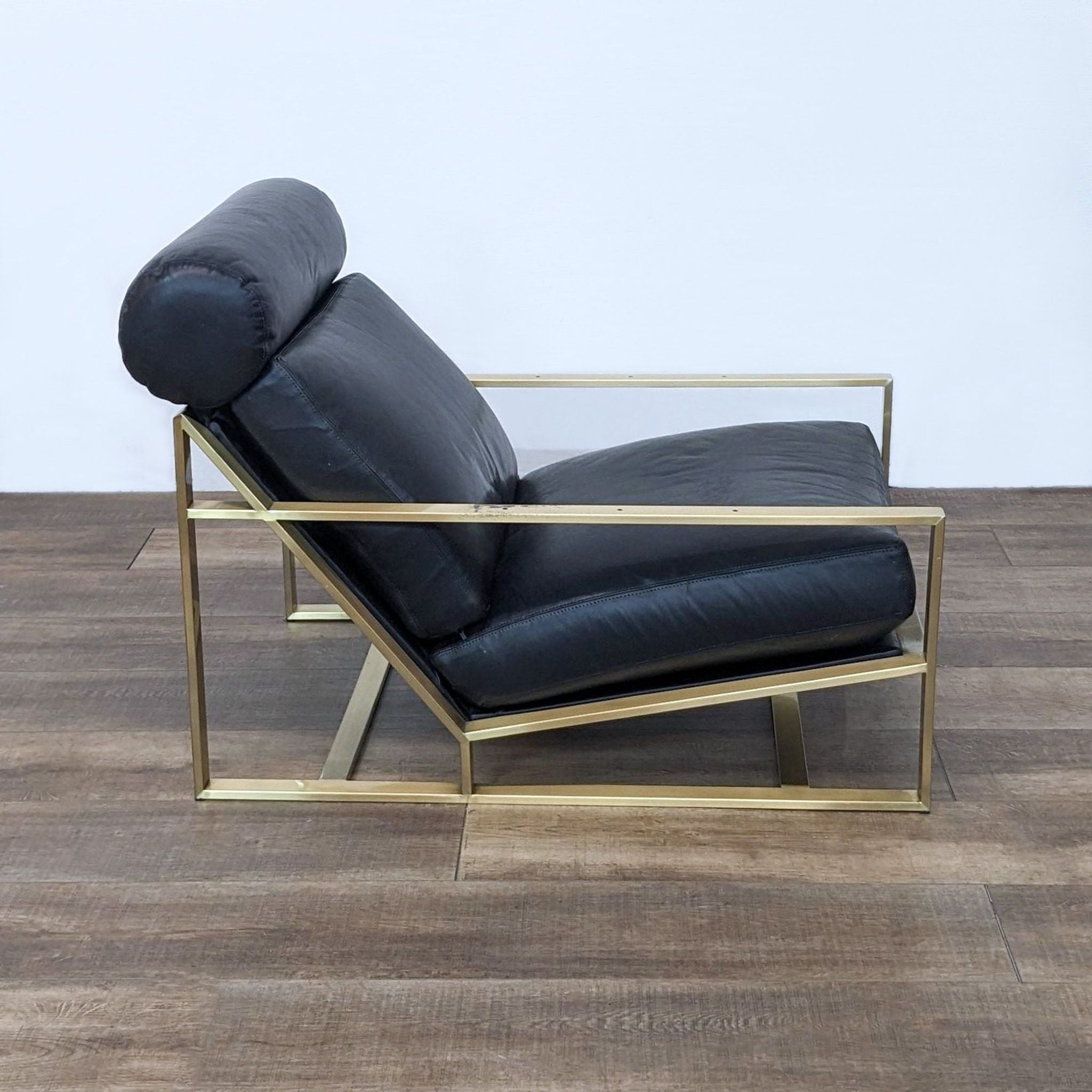 Alt text 2: Iconic midcentury modern Cruisin' lounge chair by Milo Baughman, angled view, showcasing its bronze steel frame and luxurious leather.