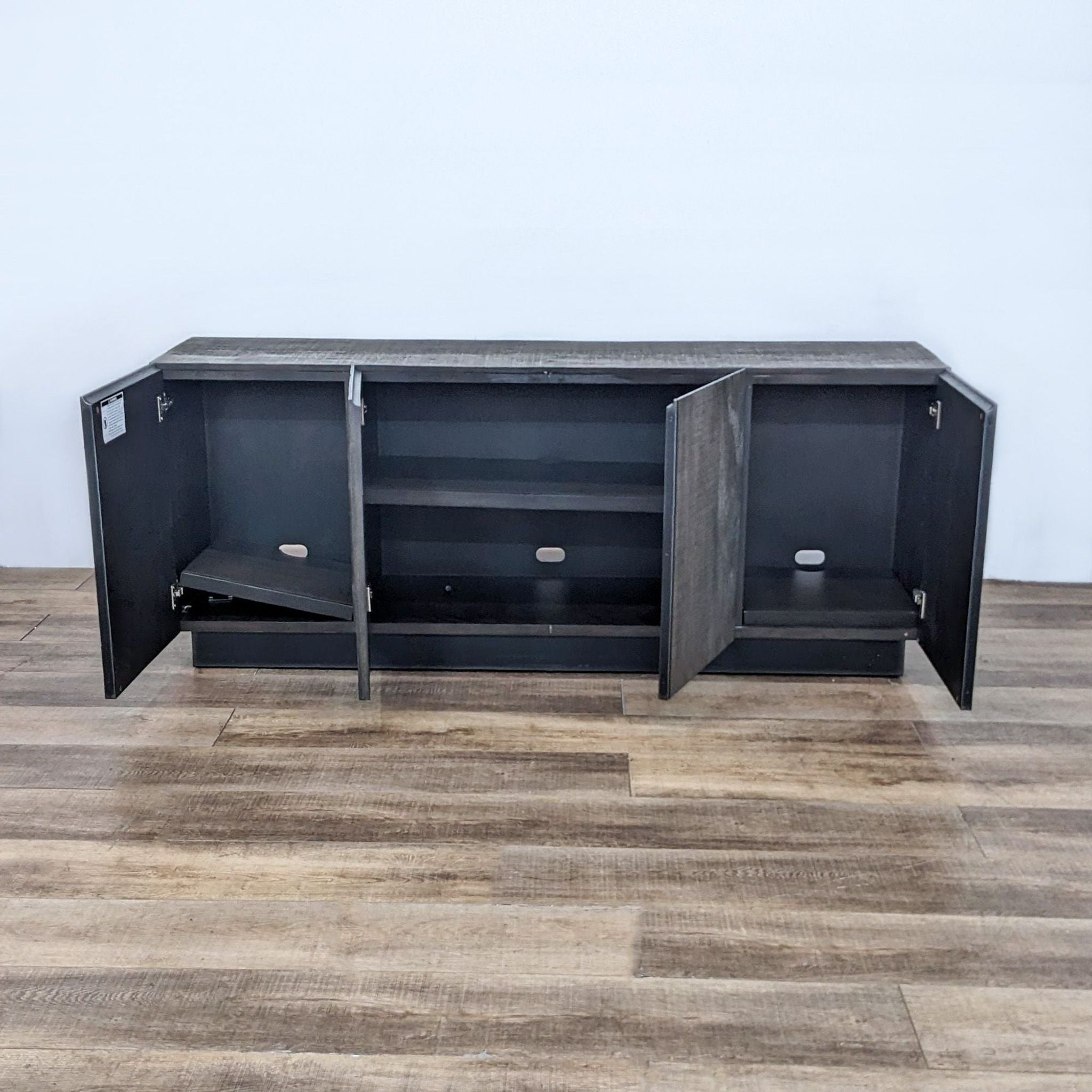 Alt text 2: Open view of a Thomas Bina-designed terra reclaimed peroba sideboard, showing interior shelves and compartments.