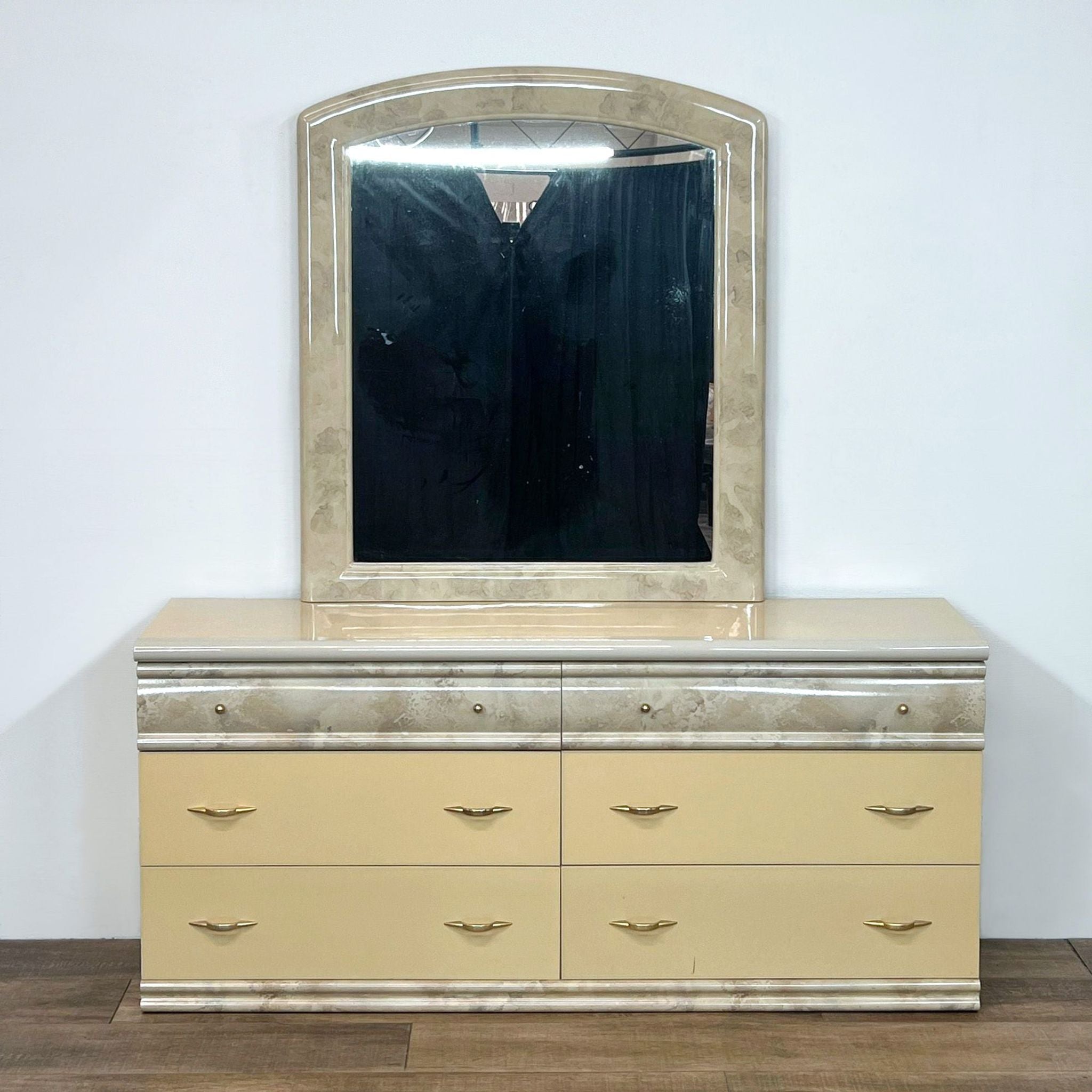 Italian Reperch 6-drawer cream dresser with faux marble top and arched vanity mirror, featuring gold handles.