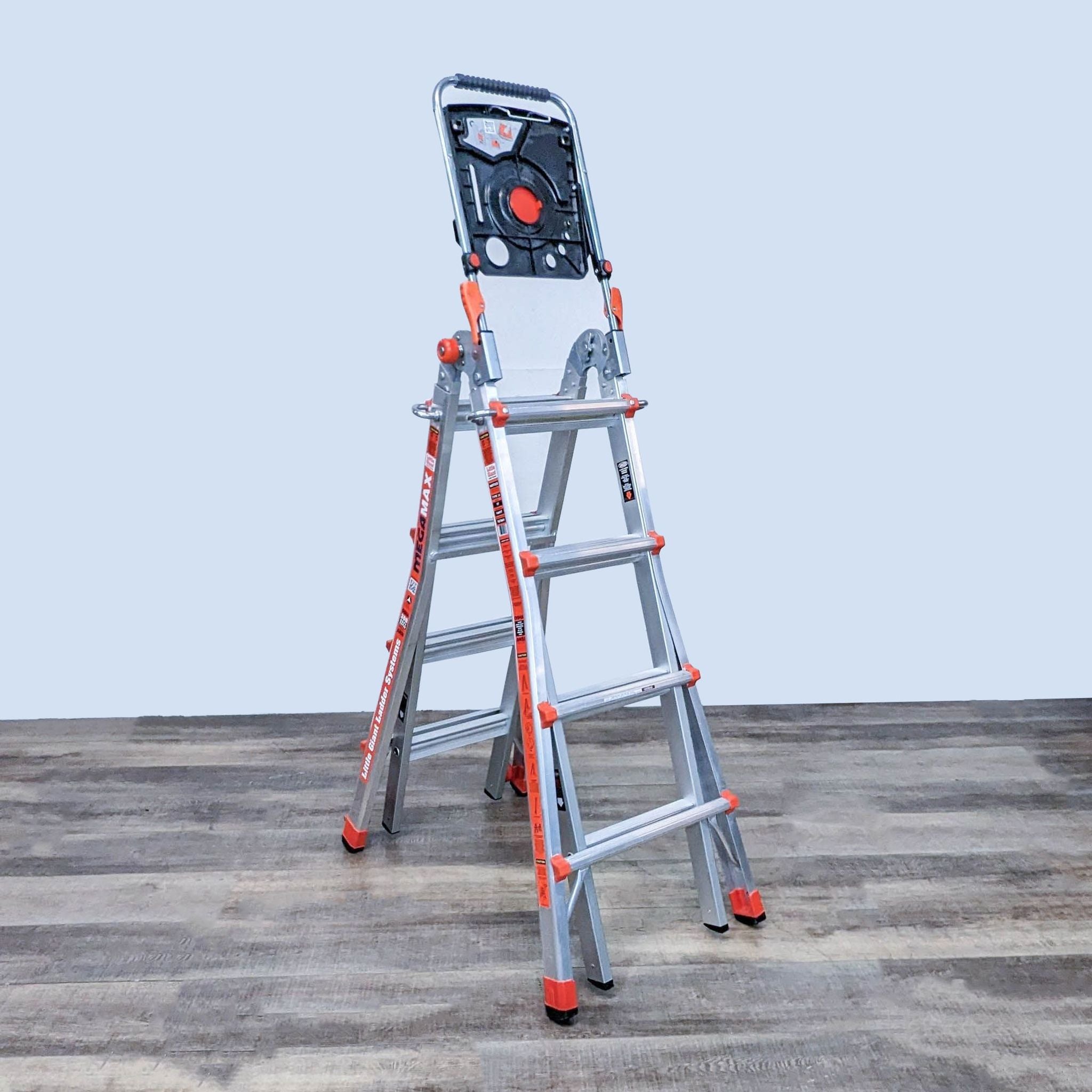 Versatile Little Giant ladder in an extended configuration with high-strength aluminum and safety locks, against a gray backdrop.