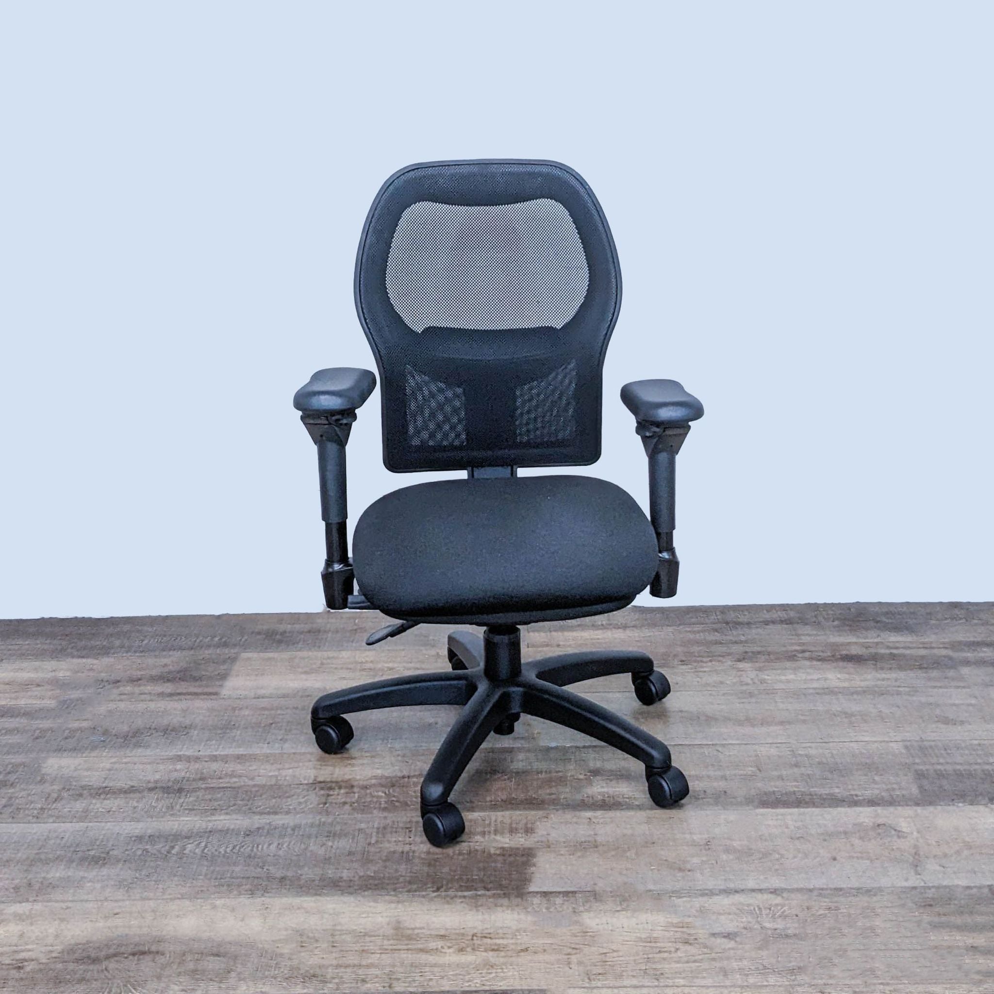 Bodybilt ergonomic office chair with adjustable back and armrests, lumbar support, on wooden floor.