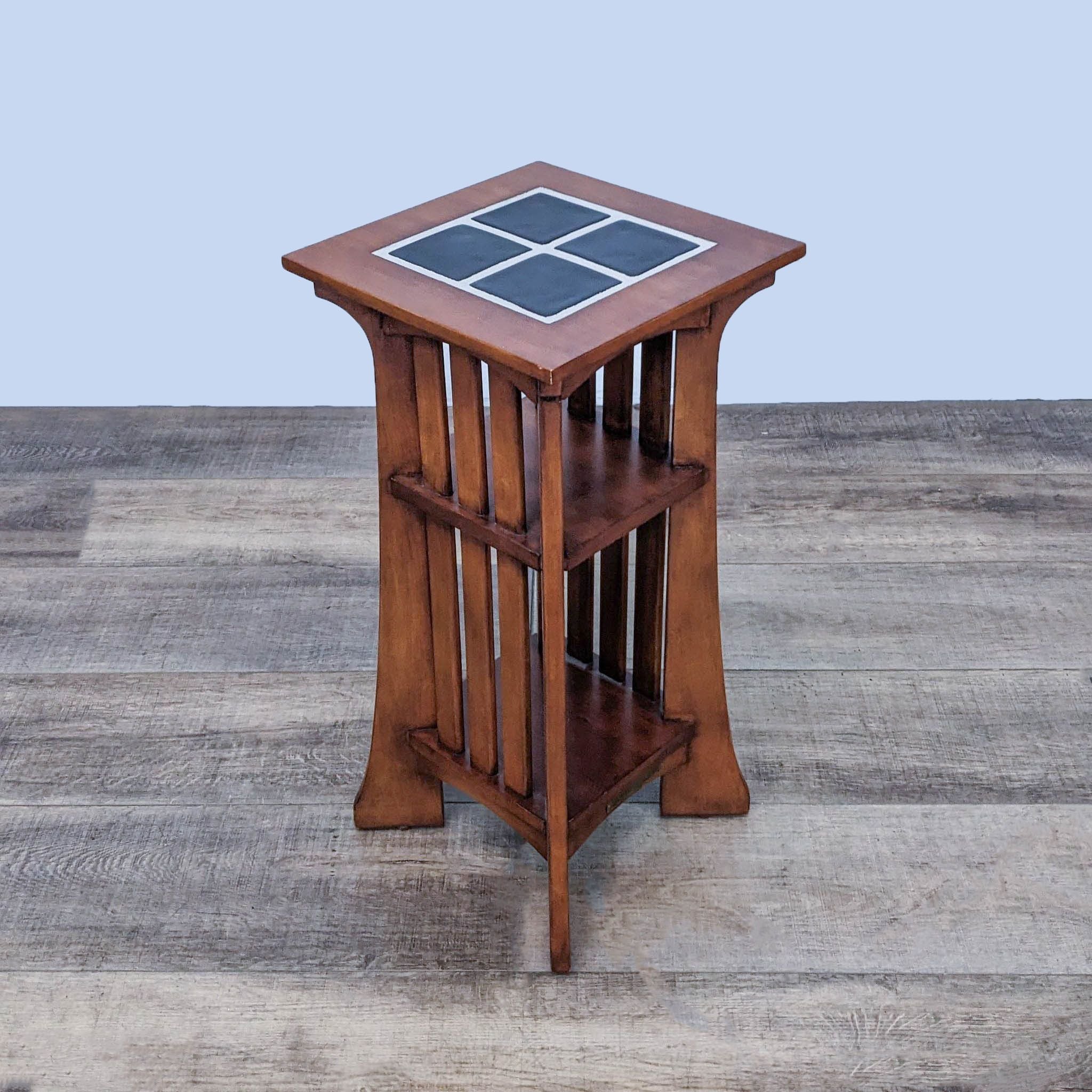 Ethan Allen Mission-style side table with four ceramic tiles on top and vertical slat sides on a wooden floor.