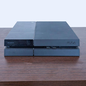 Image of Sony PlayStation 4 Console - Sleek Black Design for Endless Entertainment