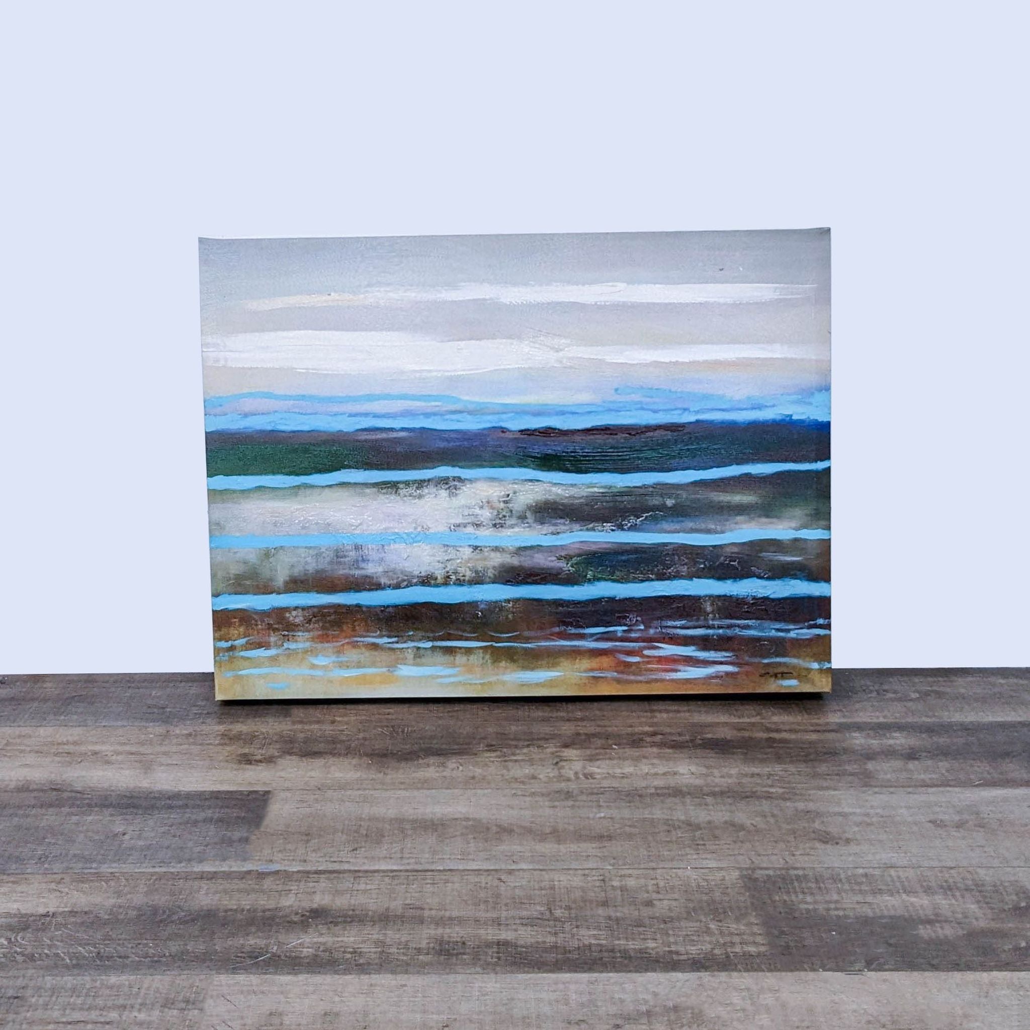 Alt text 1: Giclee print of abstract modern landscape with stylized water and cloud motifs, displayed on wooden floor.