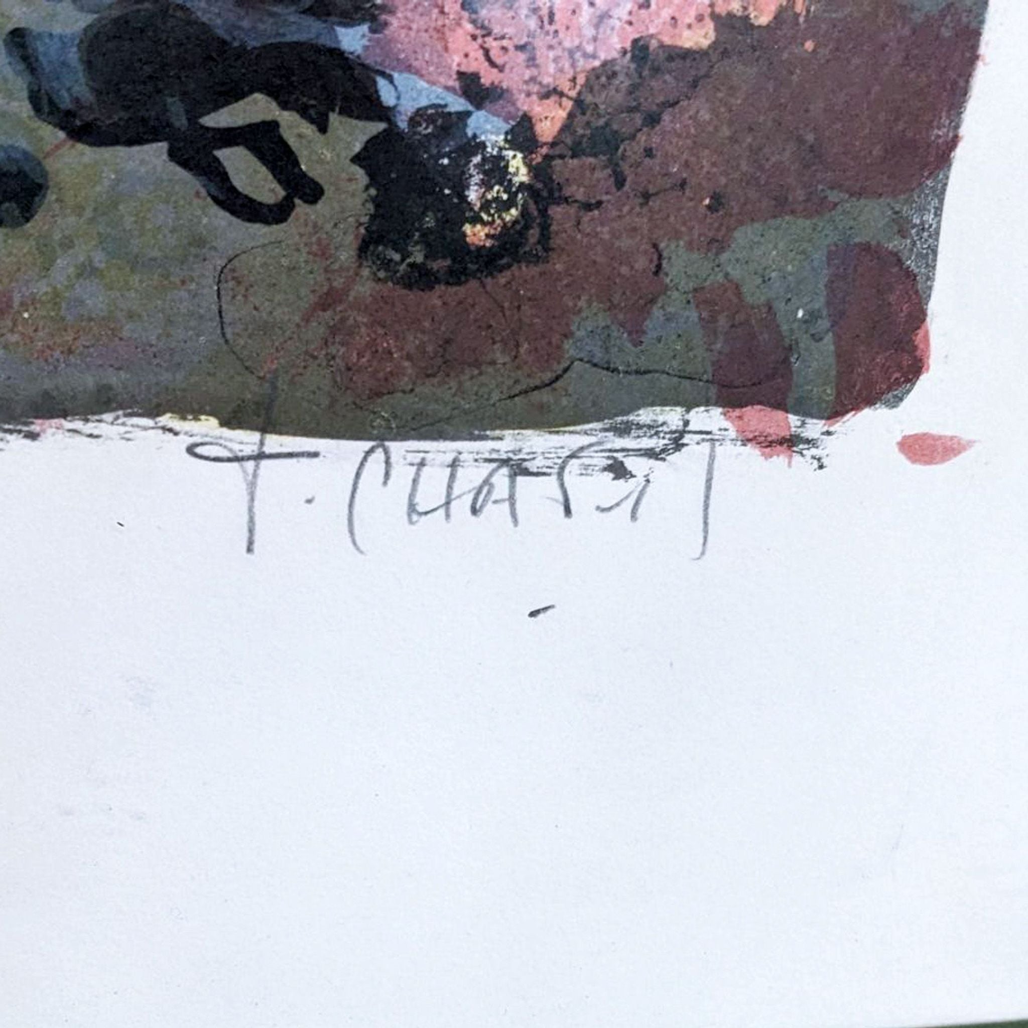 Alt text 2: Close-up of artist's signature on modern abstract artwork with round center, set against a predominantly dark background with vibrant accents.