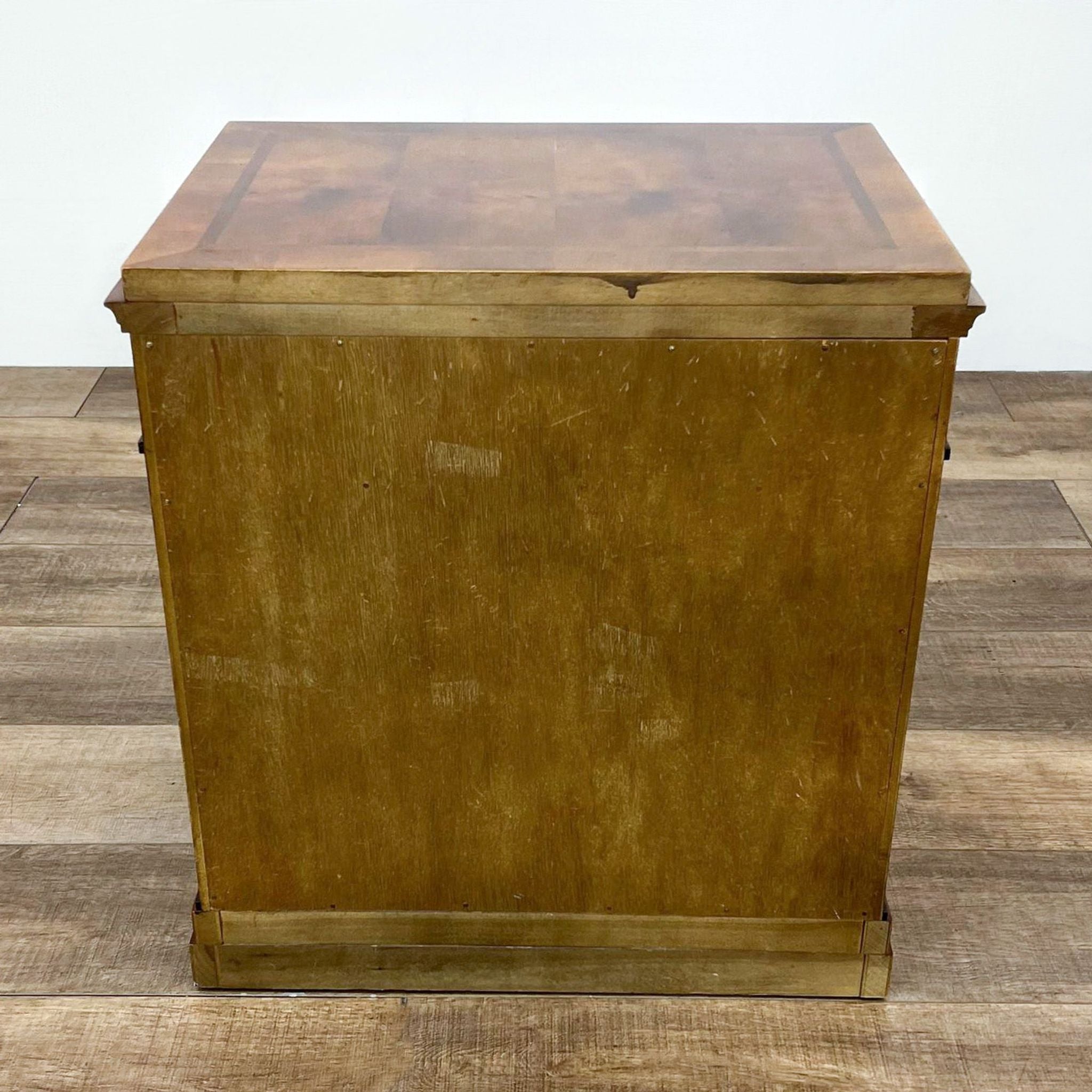 Century Furniture end table featuring two-tone design and inlaid top, viewed from side angle.