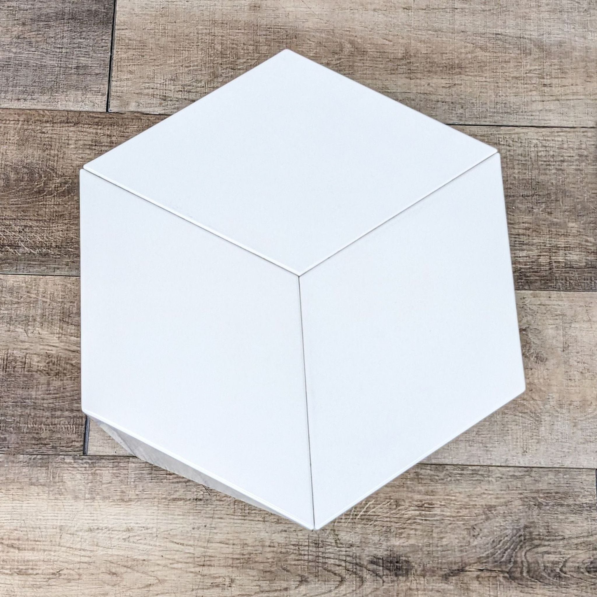 Top-down view of Vitra Prismatic Side table showcasing its hexagonal shape and aluminum material.