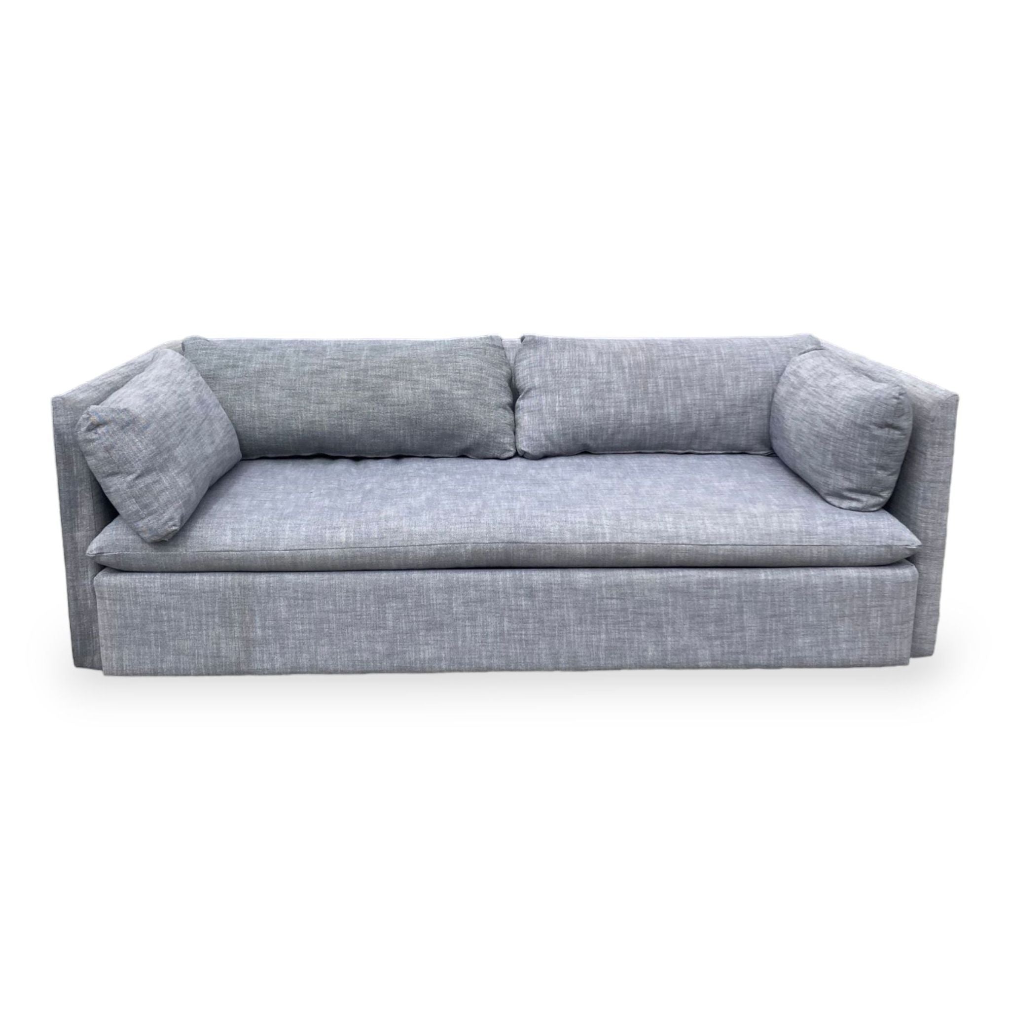 West Elm 3-seat sofa with linen weave, clean lines, shelter arms, and side pillows on a white background.
