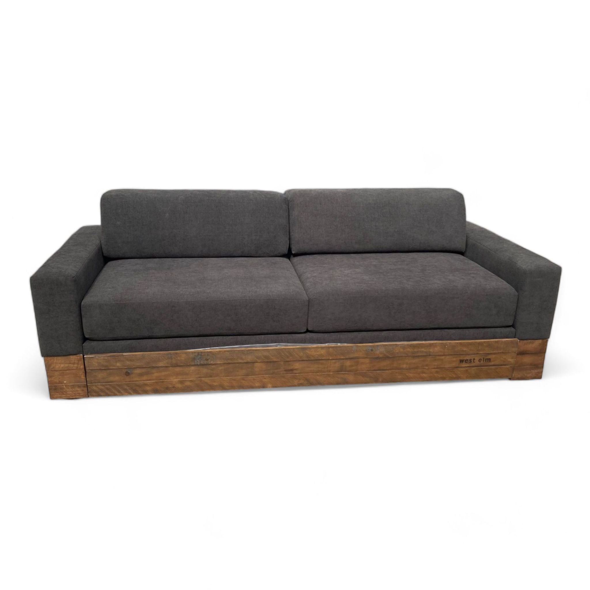 West Elm charcoal trundle daybed with block arms and reclaimed wood base, sofa configuration.