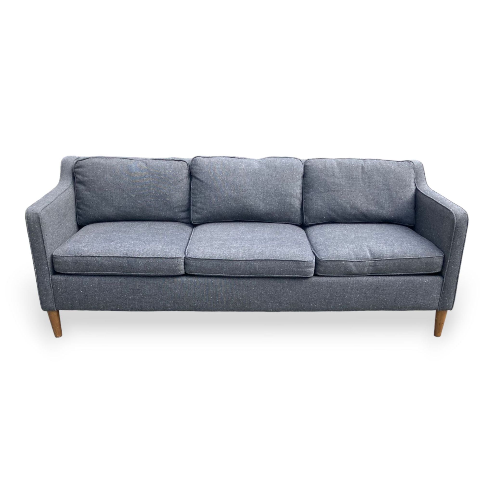Alt text 1: West Elm Hamilton 3-seat sofa with 1950's inspired silhouette, narrow sloped arms, and solid wood feet against a white background.