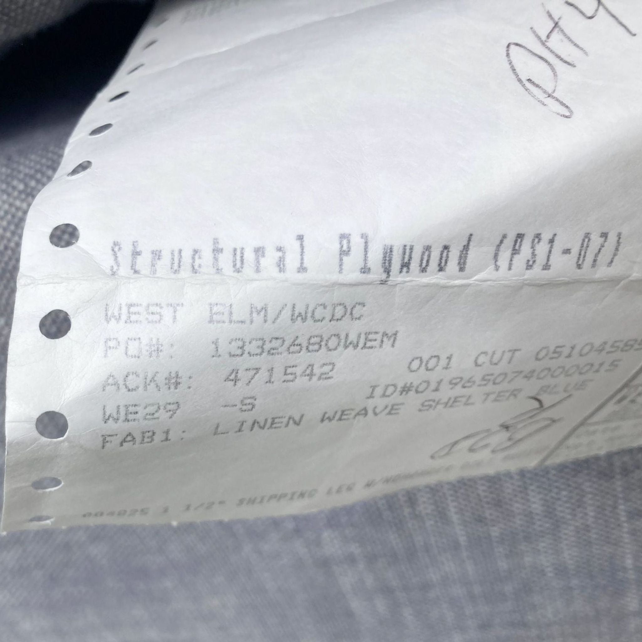 Detailed manufacturing label for a West Elm product, with specifications for a linen weave clean line bench seat sofa.