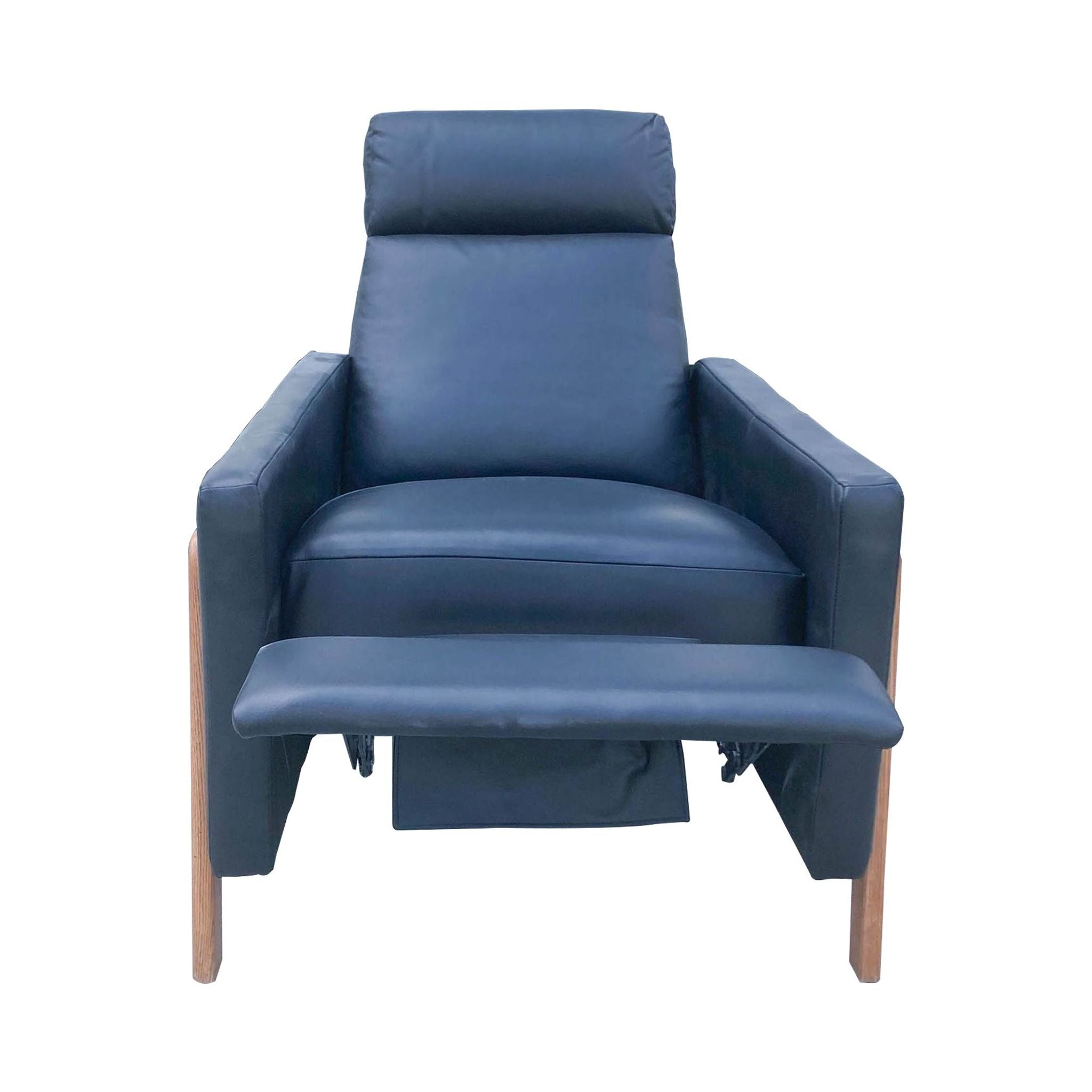 West Elm Spencer Recliner in a reclined position, highlighting the push-back function with visible leg support.