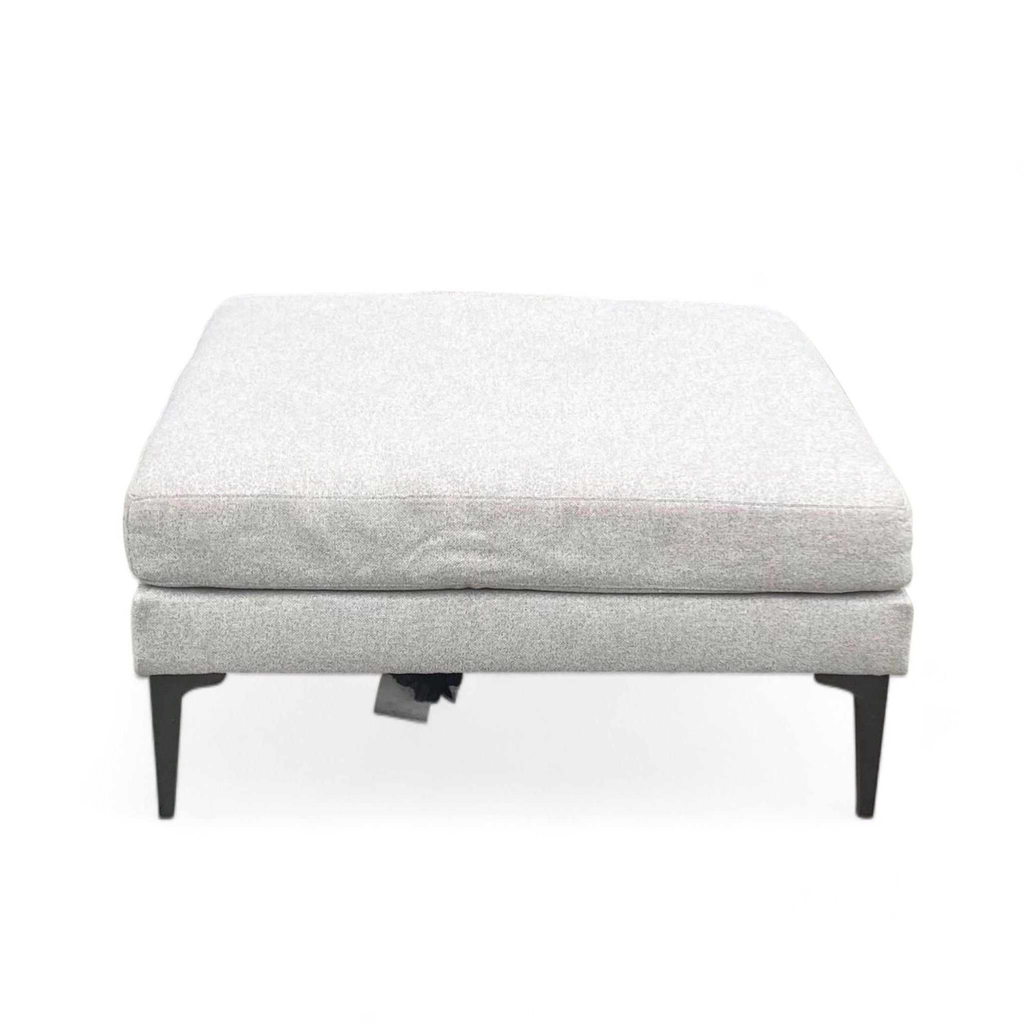 Silver grey chenille square ottoman by West Elm with dark pewter metal legs.