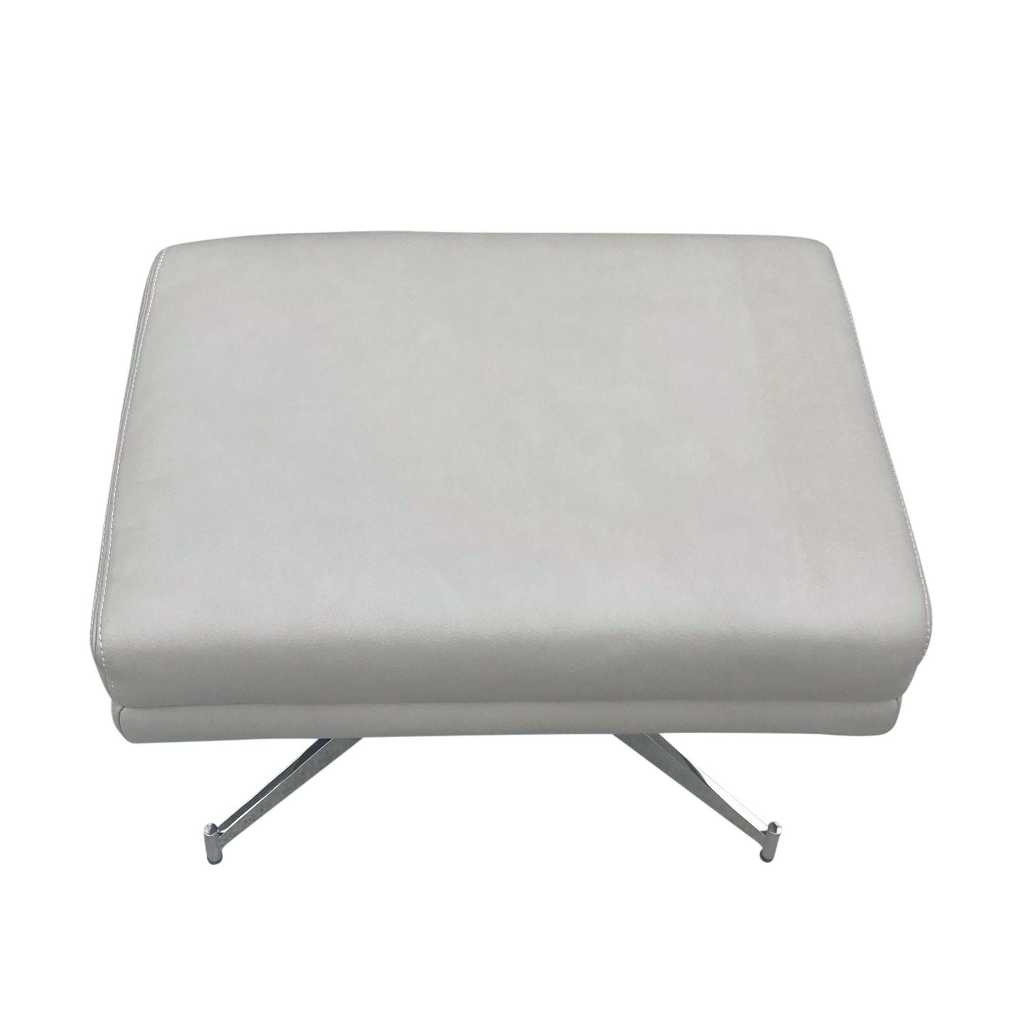 1. West Elm modern padded Austin Ottoman with a sleek chrome X-base on a white background.