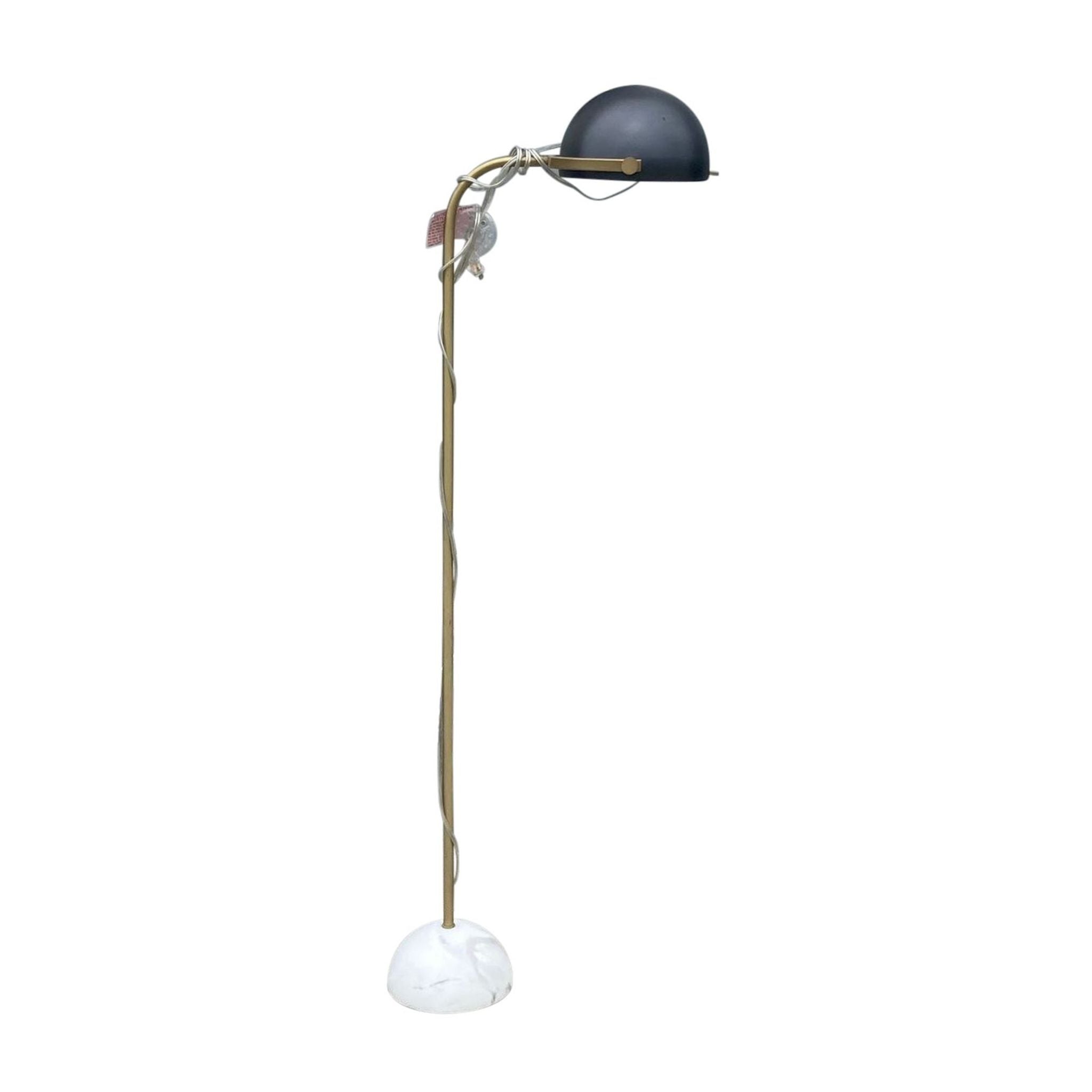 Reperch brand floor lamp with a twisted brass stand, a black shade, and a white, round stone base for stability.