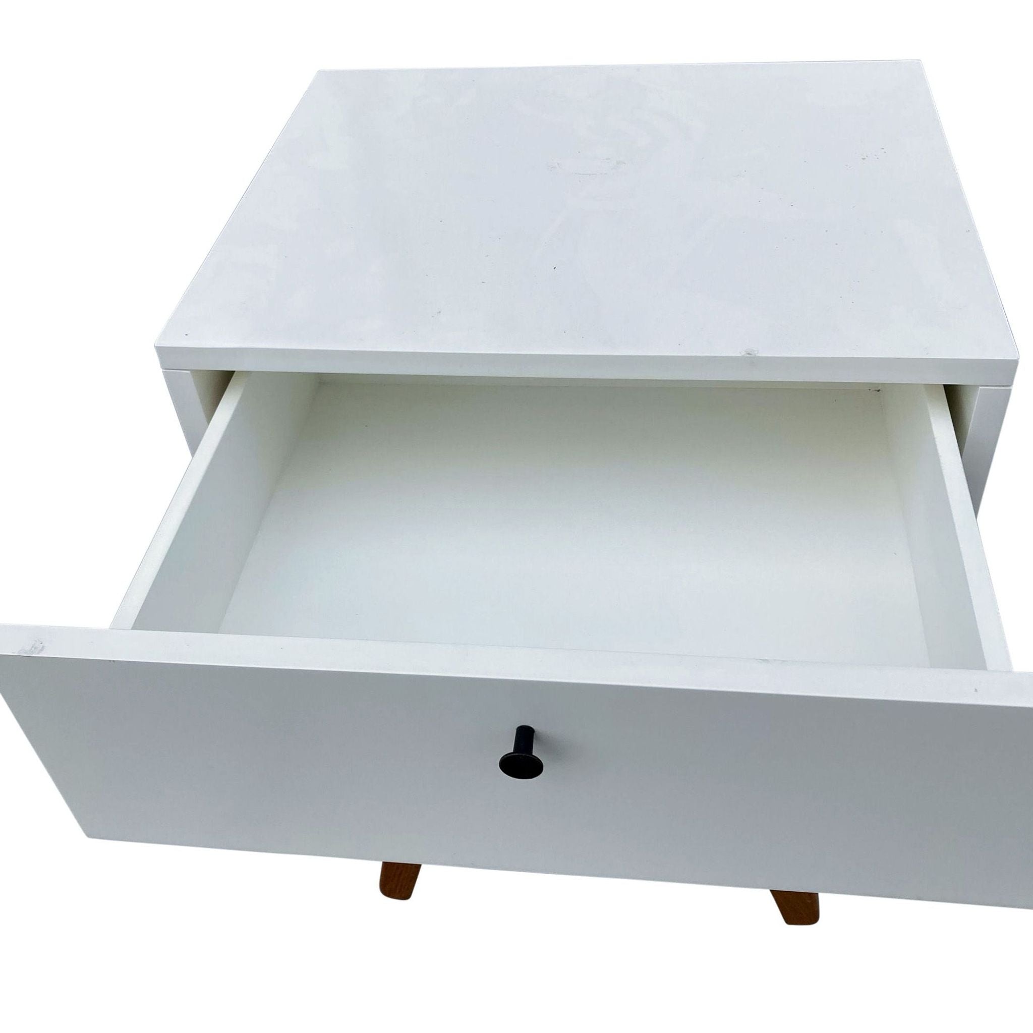 2. Open drawer view of a white Williams Sonoma end table revealing storage space, demonstrating its Mid-Century Modern design.