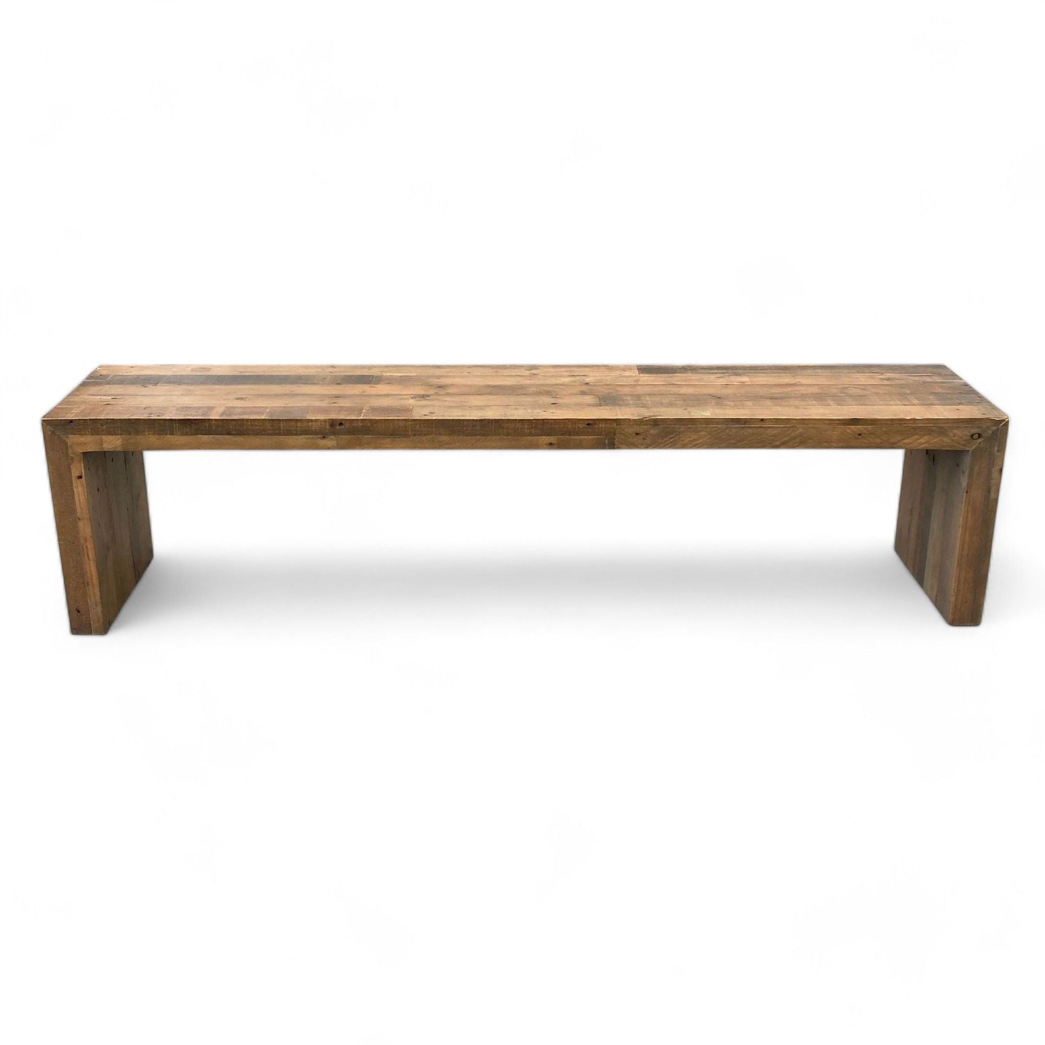 1. Long rustic wooden bench by Reperch with simple line design and visible wood grain, against a white background.