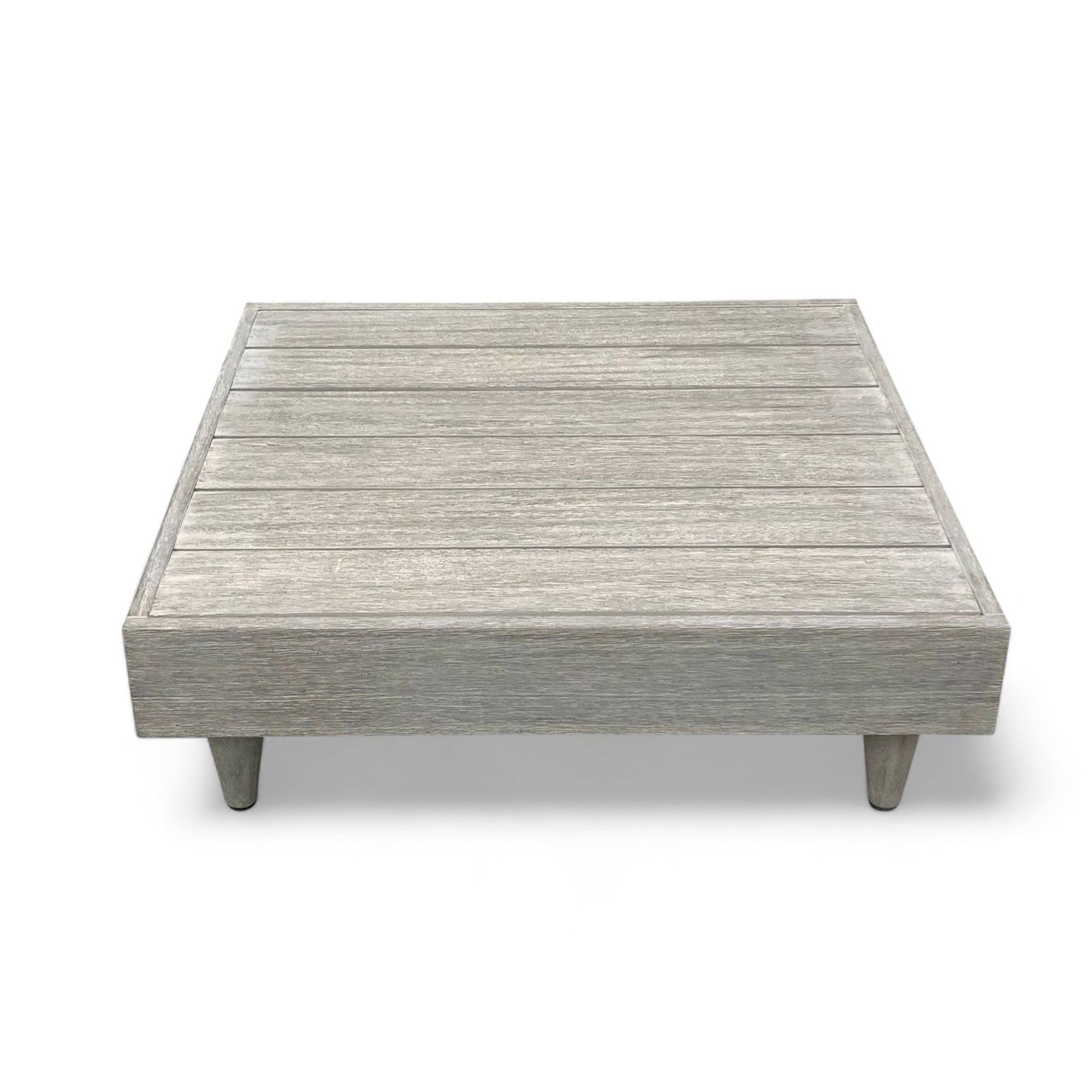 West Elm Telluride square coffee table in light wood, 32 inches with plank-style top and short legs.