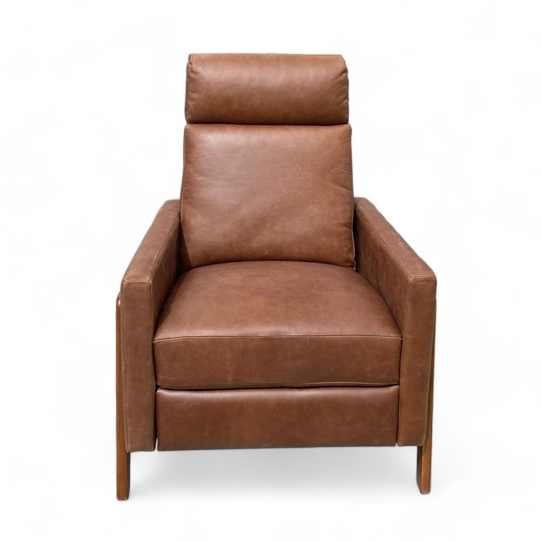 West Elm Spencer Wood-Framed Recliner with leather upholstery and a mid-century design on a white background.